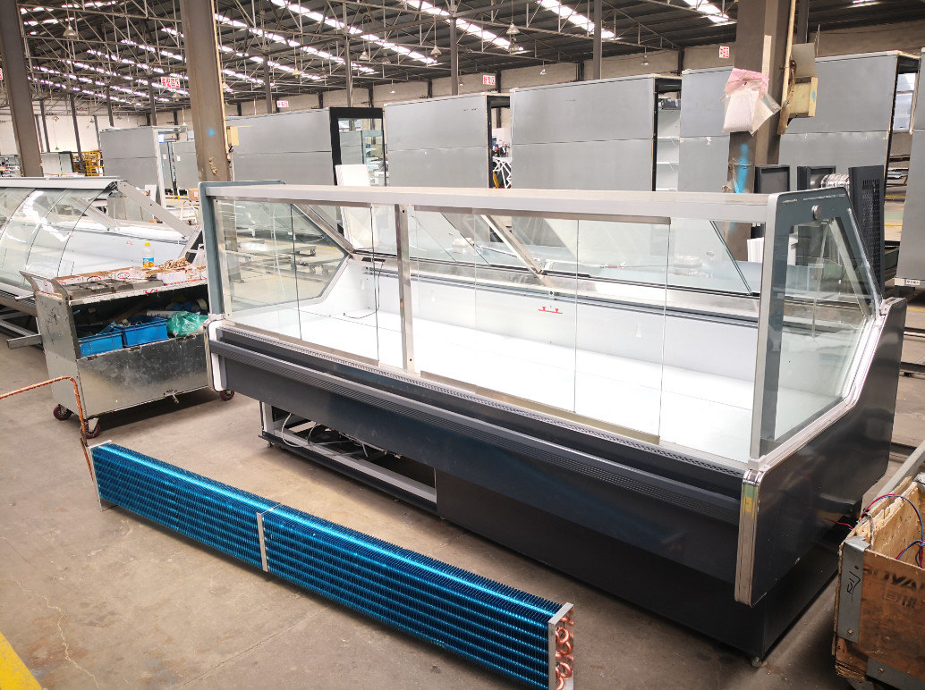 El tipo cuadrado tienda de delicatessen exhibe el refrigerador de los